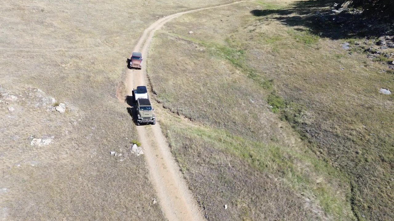 Sarge towing Backpack through the Bighorn backroads